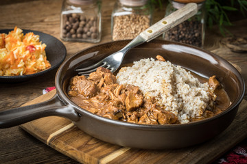Barley groats with stewed meat.