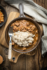 Barley groats with stewed meat.