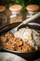 Barley groats with stewed meat.
