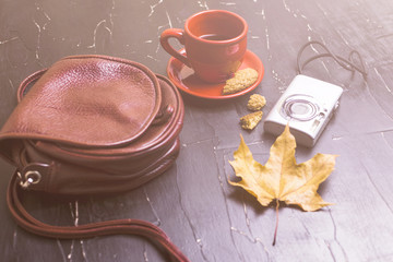 Bag, coffee, camera, autumn leaves