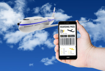 Hand hold a phone withboarding pass on the screen