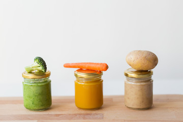 vegetable puree or baby food in glass jars