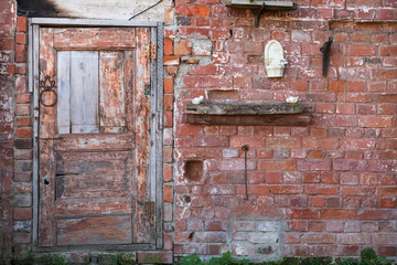 The door on the brick wall