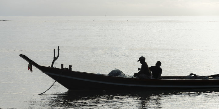 Two fishermen in boat, Koh Samui, Surat Thani Province, Thailand