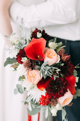 the bride's bouquet of peonies and roses, asymmetrical and modern