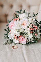 the bride's bouquet of peonies and roses, asymmetrical and modern