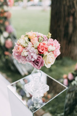 the bride's bouquet of peonies and roses, asymmetrical and modern