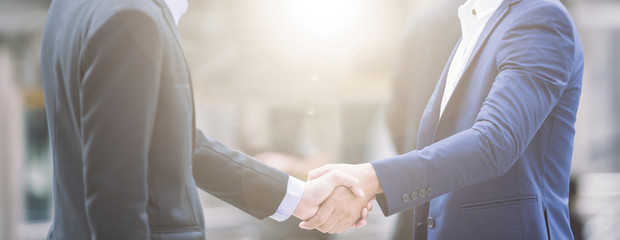 handshake of business People Colleagues Teamwork Meeting .Hold hand and shake hand in city