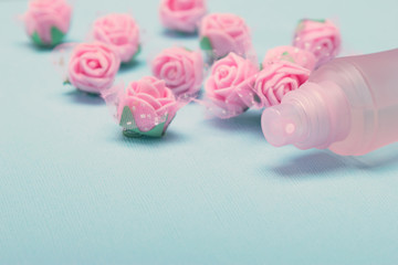 Perfume spray bottle with pink roses