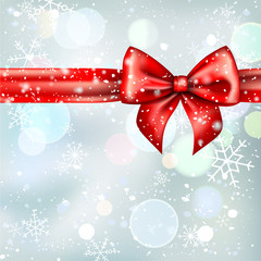 Winter background with red bow ribbon