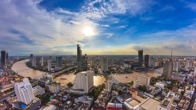 Aerial Bangkok Citysacpe And Chao Phraya River Of Bangkok, Thailand 4K Time Lapse (pan down)