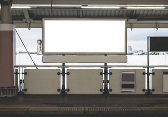 billboard with white screen for copy space on skytrain platform.