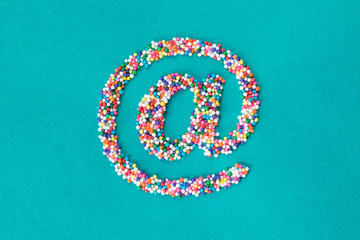 The "at/email" symbol built from nonpareils