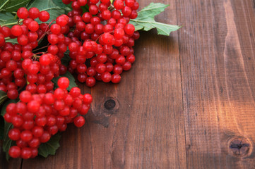 red viburnum on a wooden table