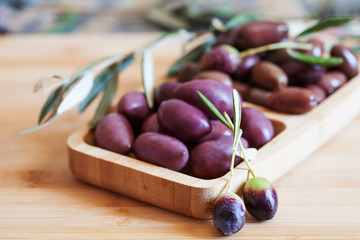 olives on wooden background, kalamata, kalamon, green olives