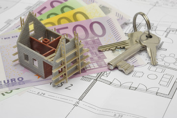 Wohnungsschlüssel und Euro Geldscheine als Miete für Wohnung