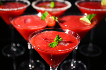 Glasses of delicious strawberry daiquiri, closeup