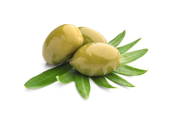 Tasty canned olives on white background