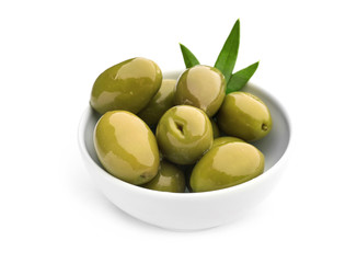 Bowl with canned olives on white background