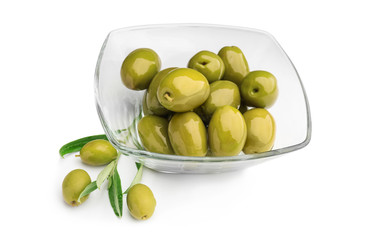 Bowl with canned olives on white background