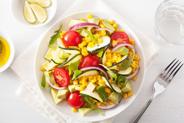 spiralized courgette salad with sweetcorn tomato avocado, healthy vegan meal
