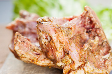 Closeup of a marinated chicken meat