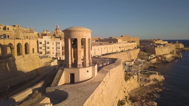 flying right past Siege Bell Monument in Valletta Malta