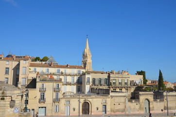 Fototapeta na wymiar Montpellier cityscape with an old church on the background