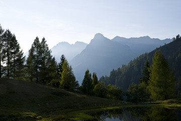 Fototapeta na wymiar Lake with mountain forest landscape-Monte Avaro-Alpi Orobie