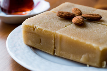 Semolina Halva with Almonds cut in square.
