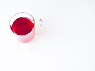 a glass of mulled wine, one for white background, space for text