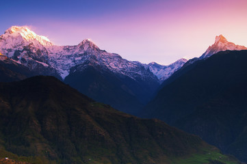 Dramatic sunrise over Annapurna mountain range seen from Ghandruk  Village in Kaski District in the Gandaki Zone of northern-central Nepal.