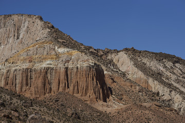 Colourful rock formations along the valley of the River Lluta on the Altiplano of northern Chile.