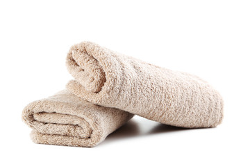 Beige towel isolated on a white background