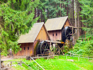 Gold ore mills. Medieval wooden water mills in Zlate Hory, Czech Republic.