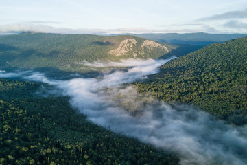 Sunset in the Ural mountains in Karatash ridge. Flying by drone