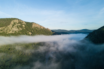 Sunset in the Ural mountains in Karatash ridge. Flying by drone