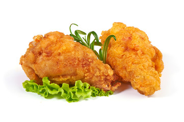 Breaded crispy fried chicken leg isolated on a white background