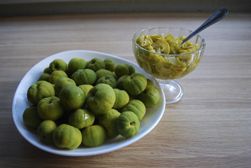 Jam from slices of Chaenomeles japonica (known as Maule's quince) green and yellow fruits in the...