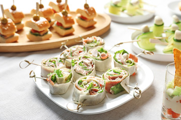 Tasty rolls for baby shower party on table