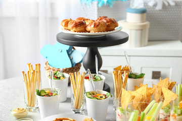 Tasty food for baby shower party on table