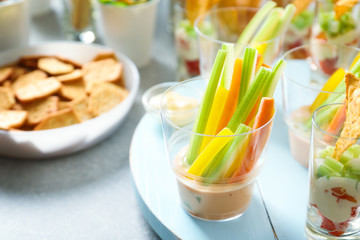 Vegetable sticks for baby shower party on table, closeup