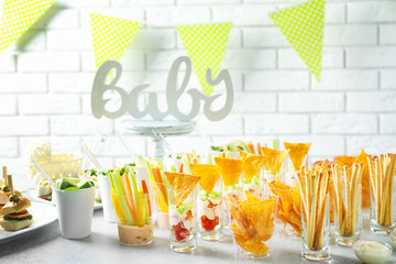 Tasty food for baby shower party on table
