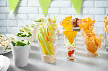 Tasty food for baby shower party on table