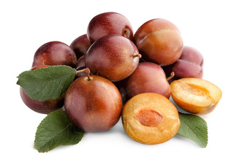 Ripe plums on white background