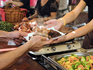 Street food. Sausages, meat, potatoes, mushrooms