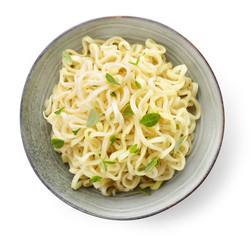 Bowl of boiled egg noodles with spices and herbs