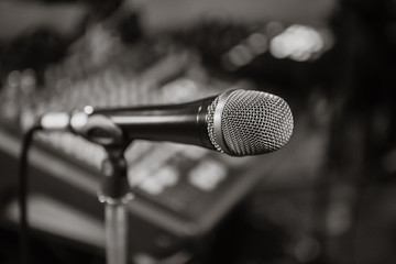 Microphone. Black and white photo. Microphone on stage. Microphone close-up. A pub. Bar. A restaurant. Classical music. Music