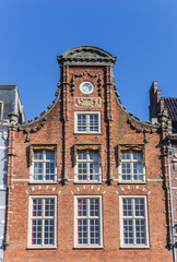 Historic facade at the main market square of Haarlem