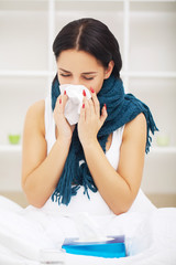 Cold And Flu. Portrait Of Ill Woman Caught Cold, Feeling Sick And Sneezing In Paper Wipe. Closeup Of Beautiful Unhealthy Girl Covered In Blanket Wiping Nose. Healthcare Concept. High Resolution